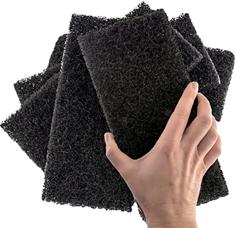 scouring pad and water remove tar